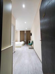 A bed or beds in a room at Hotel N