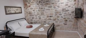 Postel nebo postele na pokoji v ubytování APARTMAN B