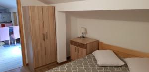 Postel nebo postele na pokoji v ubytování Apartmani Kurjaković - Punat