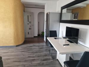 TV a/nebo společenská místnost v ubytování Apartament Gara de Nord