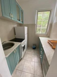 Kuchyň nebo kuchyňský kout v ubytování L & D Panorama Apartmani + 7 fotografií
