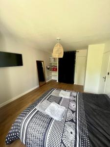 Postel nebo postele na pokoji v ubytování Agréable T2 idéalement situé