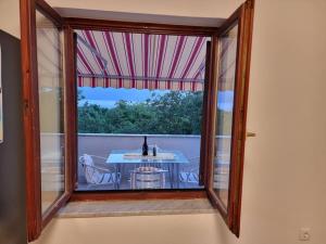 Balkón nebo terasa v ubytování Apartman Flavio