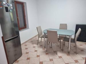 Kuchyň nebo kuchyňský kout v ubytování Apartman Flavio