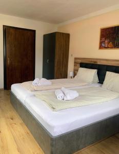 Postel nebo postele na pokoji v ubytování Appartements Konrad + 17 fotografií