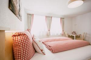 Postel nebo postele na pokoji v ubytování Nedererhof - Ferienwohnung Gamskar