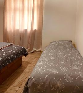 Un pat sau paturi într-o cameră la Peaceful Place - Skadar Lake