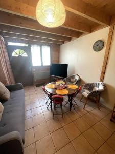 Posezení v ubytování la p'tit marennaise + 5 fotografií