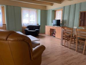 Posezení v ubytování Historische Maisonette-Wohnung mit Gästekarte und Ermässigungen