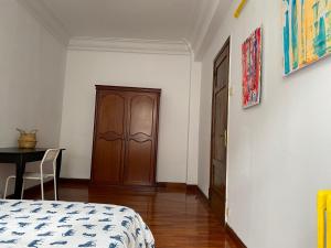 En eller flere senge i et værelse på Habitación individual Juan florez A Coruña