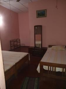 Voodi või voodid majutusasutuse Kataragama holiday Home s Rooms Rentall toas