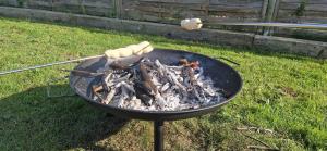 a grill with some food on top of it at Tinymansion in Brabrand