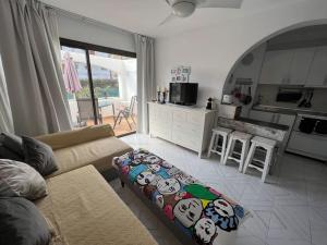Khu vực ghế ngồi tại Vacaciones al sol San Agustin con piscina y WIFI