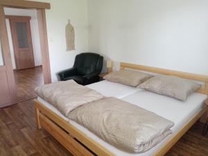 Postel nebo postele na pokoji v ubytování Apartmány Jablunkov
