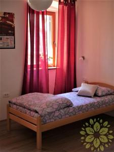 Postel nebo postele na pokoji v ubytování Apartma Giordana Koper