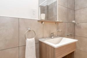 Koupelna v ubytování Departamento en el centro turístico de Buenos Aires, excelente ubicación + 8 fotografií