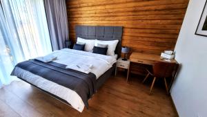 Ένα ή περισσότερα κρεβάτια σε δωμάτιο στο Monte Amnis Apartment