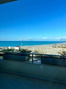 a view of the beach from a balcony at Ascensore per la spiaggia in Cirella