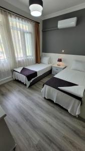 Canada Hotel & Bungalows客房内的一张或多张床位