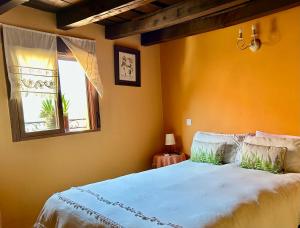 A bed or beds in a room at Casa Artista