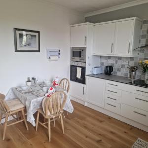 Kuchyň nebo kuchyňský kout v ubytování 3 Bedroom Apartment max 5 Pax Musselburgh + 12 fotografií