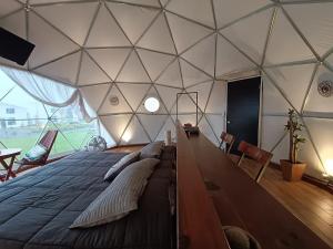 Posezení v ubytování Mantra Glamping & Chalets