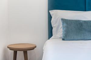 Cama o camas de una habitación en Hotel Grande Rio