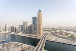 Fotografie z fotogalerie ubytování Zada Tower 1BR Holiday Home v Dubaji