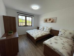 Cama o camas de una habitación en Apartmány Lipka