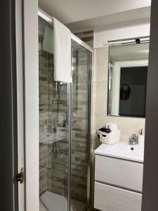 a bathroom with a shower and a sink at La Esperanza De Santa Rita in Bari