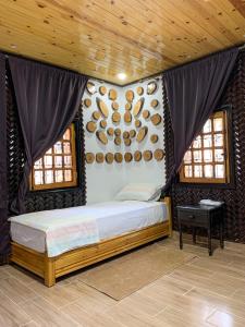 Tempat tidur dalam kamar di Chalet nina