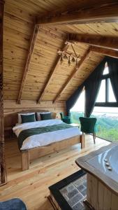 Postel nebo postele na pokoji v ubytování Mavera Suit Bungalow