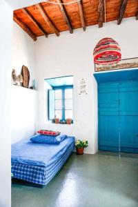 Lova arba lovos apgyvendinimo įstaigoje Traditional Cycladic House with Breathtaking View