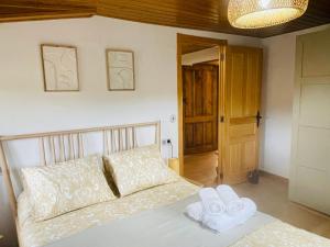 Postel nebo postele na pokoji v ubytování Casa Neto Goje