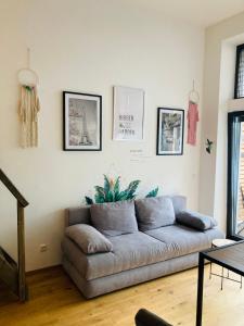 a living room with a couch in a room at Rittertal in Altmünster