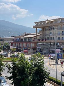 a view of a city with a building and a street at SNEZANA APARTMENT in Ohrid