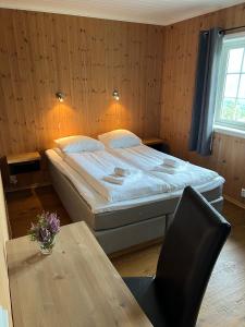 Ein Bett oder Betten in einem Zimmer der Unterkunft Hydlahytta Stryn