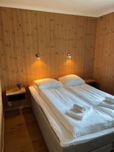 Ein Bett oder Betten in einem Zimmer der Unterkunft Hydlahytta Stryn