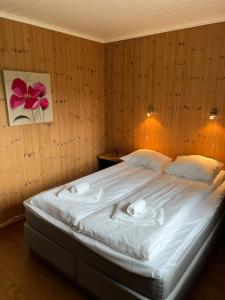 Ein Bett oder Betten in einem Zimmer der Unterkunft Hydlahytta Stryn