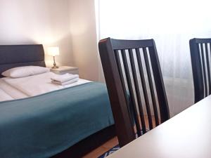 Posteľ alebo postele v izbe v ubytovaní Apartament CENTRUM/STARÓWKA Gdańsk