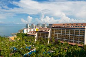 a view of a resort with the ocean and buildings at The Westin Resort & Spa, Puerto Vallarta in Puerto Vallarta
