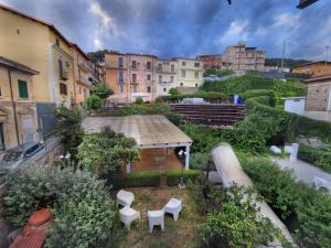 an overhead view of a courtyard with benches and buildings at Casa Lissania in Lamezia Terme
