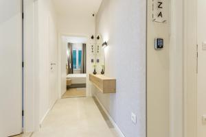 Postel nebo postele na pokoji v ubytování Top Floor Luxury Rooms