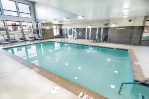 a large swimming pool in a building at Residence Inn by Marriott Reno Sparks in Sparks