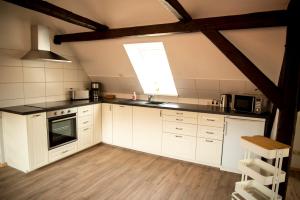 Kuchyň nebo kuchyňský kout v ubytování Ferienwohnung Up'n Spitzböhn + 4 fotografie