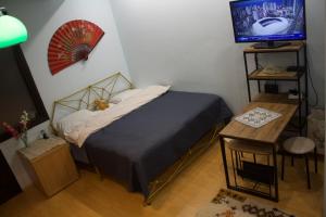 מיטה או מיטות בחדר ב-Private Bedroom Cosy and Comfy in the city centre