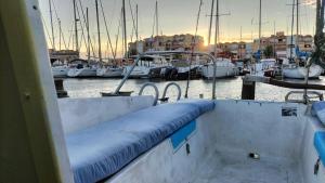 a view of a boat with boats in a marina at La Perle d'orient A man donné in Gruissan