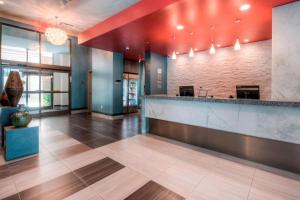 an office lobby with a reception counter at Residence Inn by Marriott Raleigh Downtown in Raleigh