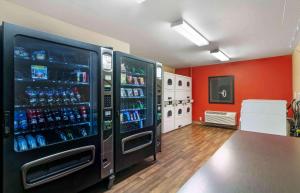 a room with two vending machines with drinks at Extended Stay America Suites - Kansas City - South in Kansas City