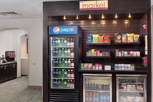 a soda machine in a store with drinks at Residence Inn Chicago O'Hare in Rosemont